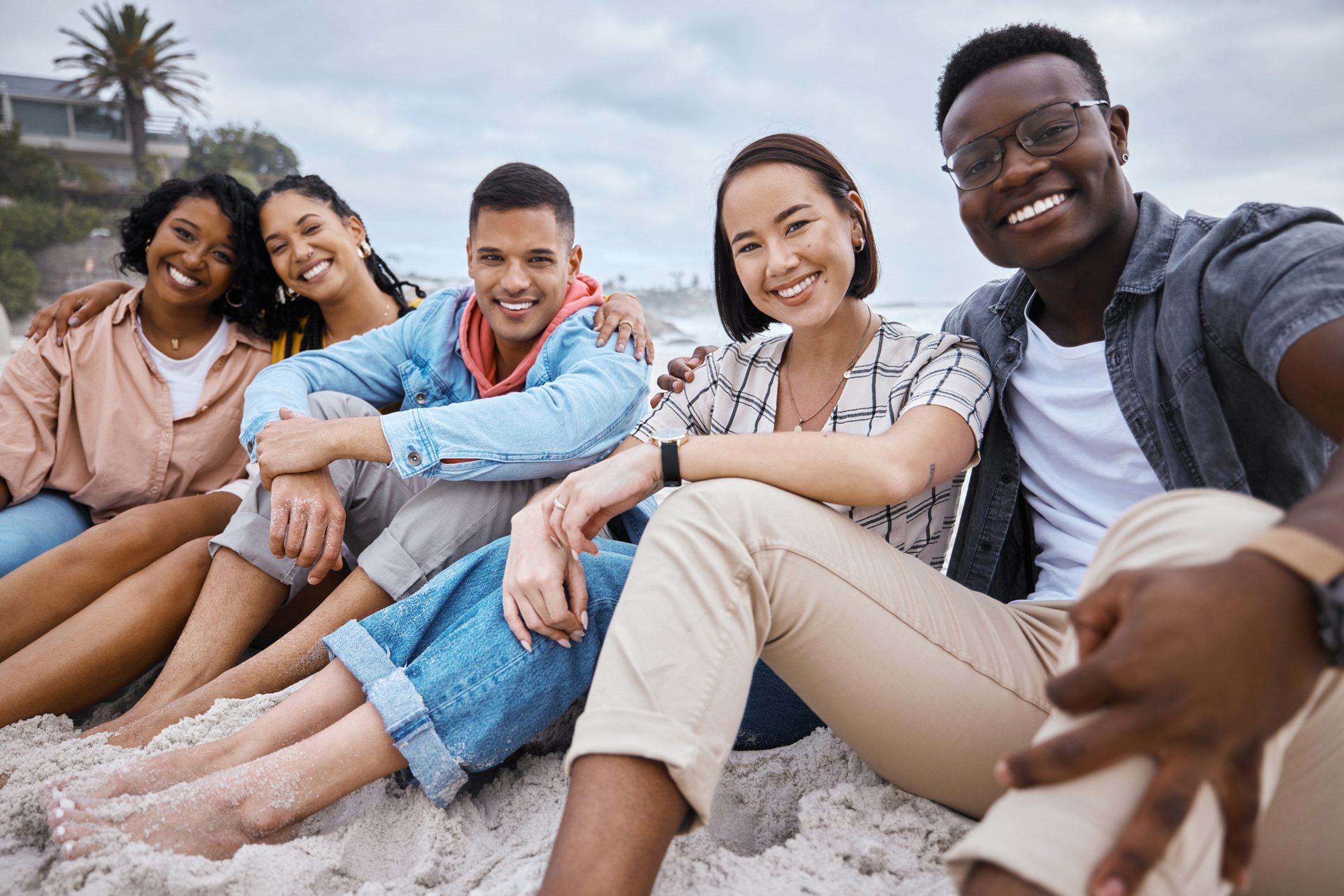 happy adults on the beach
